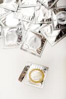 An open condom in a package. Male contraceptives. Secure Seal Technology for Ultimate Safety photo