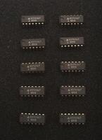 Microchips on carbonized base. Clustered components on a layer. photo