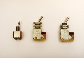 Electric switch on a white background. photo