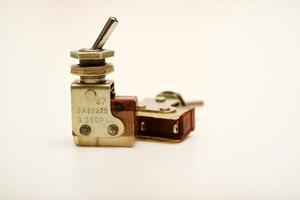 Electric switch on a white background. Equipment switch. photo