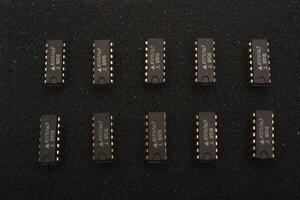 Chip modules on shadow foam. Layered elements on a plate. photo