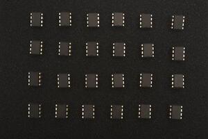 Circuitry clusters on blackened core. Embedded cores on a PCB. photo