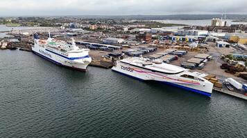 Aerial view of commercial harbor with ferry and containers photo