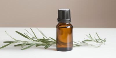 Essential oil bottle placed beside fresh herbs on a smooth surface in a serene indoor setting photo
