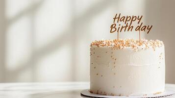 Celebrating a special occasion with a beautifully decorated birthday cake adorned with golden sprinkles and a cheerful message photo