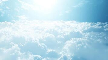 serene view of fluffy white clouds under bright blue sky, illuminated by soft sunlight, creating peaceful and dreamy atmosphere photo
