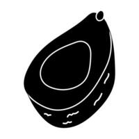 Avocado showing inner pit and textured skin captured in simple black and white design vector