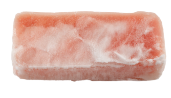 a piece of frozen ready meal food block with visible frost and icy surface texture on isolated background for packaging and food processing concept png