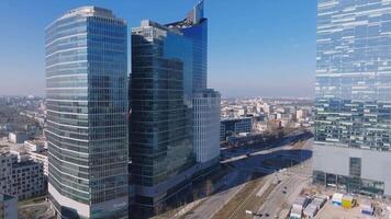 Aerial view of Warsaw, Poland, featuring the Varso Tower, high rise buildings, cranes in motion, and a sweeping view of the modern cityscape. video
