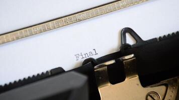 Typing the expression Final Chapter with an old manual typewriter video