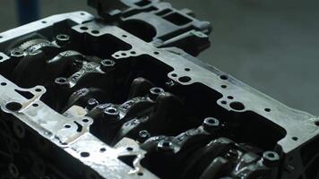 Closeup open car engine. Car mechanic in garage with car engine after remove the cover part. Car engine repair. Auto service video