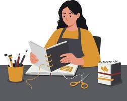 Woman crafting a scrapbook with scissors, pens, and decorative elements on a table vector