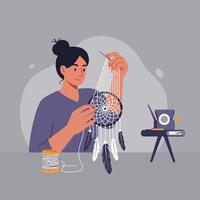 Woman creating a dreamcatcher using thread, feathers, and a needle in a cozy setting vector