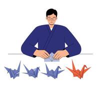 Man creating colorful origami cranes in flat style art vector