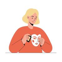 Woman applying face paint on a mask in flat art style vector