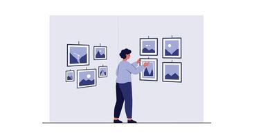 Person arranging pictures in a gallery setting with flat art style illustration vector