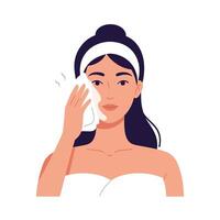 Woman gently cleansing her face with a soft cloth in a spa-like setting vector