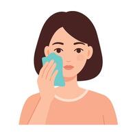 Woman using a soft cloth to cleanse her face with a gentle expression vector