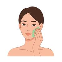 Woman applying facial cleanser using a green sponge for skincare routine vector
