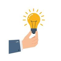 Hand holding a glowing light bulb in flat art style vector