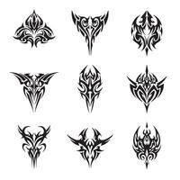 Tribal design set with fierce animal face icons Maori-inspired tattoos abstract symmetry and vintage silhouette wing patterns for use in templates vector