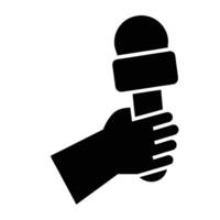 Black Silhouette Of Hand Holding A Microphone For Interview Or Broadcast vector