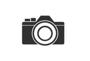 Simple Silhouette of a Modern Camera. This is a clean minimalist graphic of a camera on a white background vector