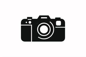 Simple Black and White Camera Icon. A clean minimalist black silhouette of a camera on a plain white background vector