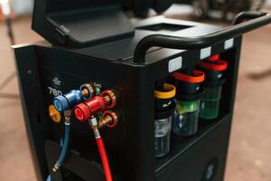 Close up view of, device with red and blue wires photo