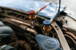 Close, up view of the car that is in the automobile repair salon photo