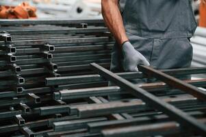 Close up, view of man that is working at the factory photo