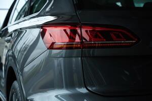 Close, up view of modern black car that is parked photo