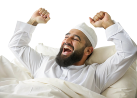 Muslim man stretching with a joyful expression in bed, embracing a fresh start to the day on a Transparent Background png