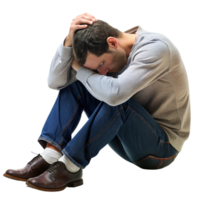 Young man curled up on the floor in a defeated posture, displaying emotional pain, mental health struggles, and despair png