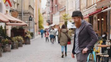 Tourist traveler young man using looking smartphone search a way on map in mobile navigator app video