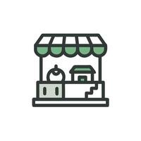 A green and white icon of a store vector