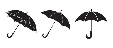 Three Simple Black Umbrellas on a White Background vector