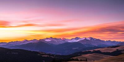 Panoramic Sunset View Over Rocky Mountains photo