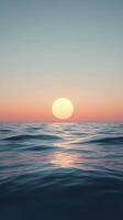 Sunset Over Calm Ocean Waves photo