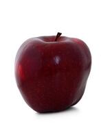 Vibrant red apple glistens under soft light, showcasing its smooth texture and rich color, inviting a sense of freshness and healthiness photo