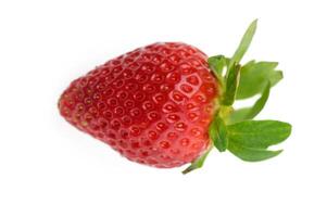 Fresh and vibrant strawberry resting on a clear background reflecting summer's photo