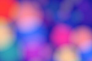 blurred rainbow colors on blue background bokeh pride background vector