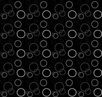 Seamless abstract geometric pattern of gray circles on a black background vector