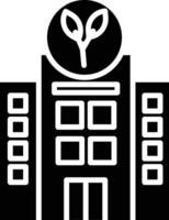 A black and white building with a plant on top vector