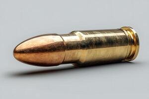 Close-Up of Shiny Bullet Ammunition for Firearms Concept and Design Elements photo