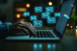 Digital Communication Concept Hands Typing on Laptop with Email Icons for Technology Design photo