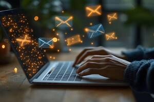 Digital Communication Hands Typing on Laptop with Floating Email Icons photo