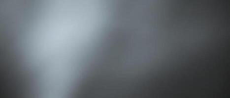 A monochromatic image featuring varying shades of gray, creating a smooth, gradient effect with a subtle texture.A black and gray background. vector