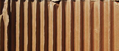 Corrugated cardboard texture showcasing ridged design and sturdy structure for various uses photo