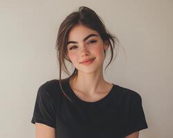 Beautiful young woman with a smile posing for the camera photo